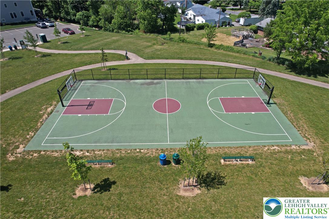 4502 Benjamin Court Emmaus, PA 18049 - Photo 53 of 53 An outdoor basketball court provides recreational activity amidst a well-maintained park setting.