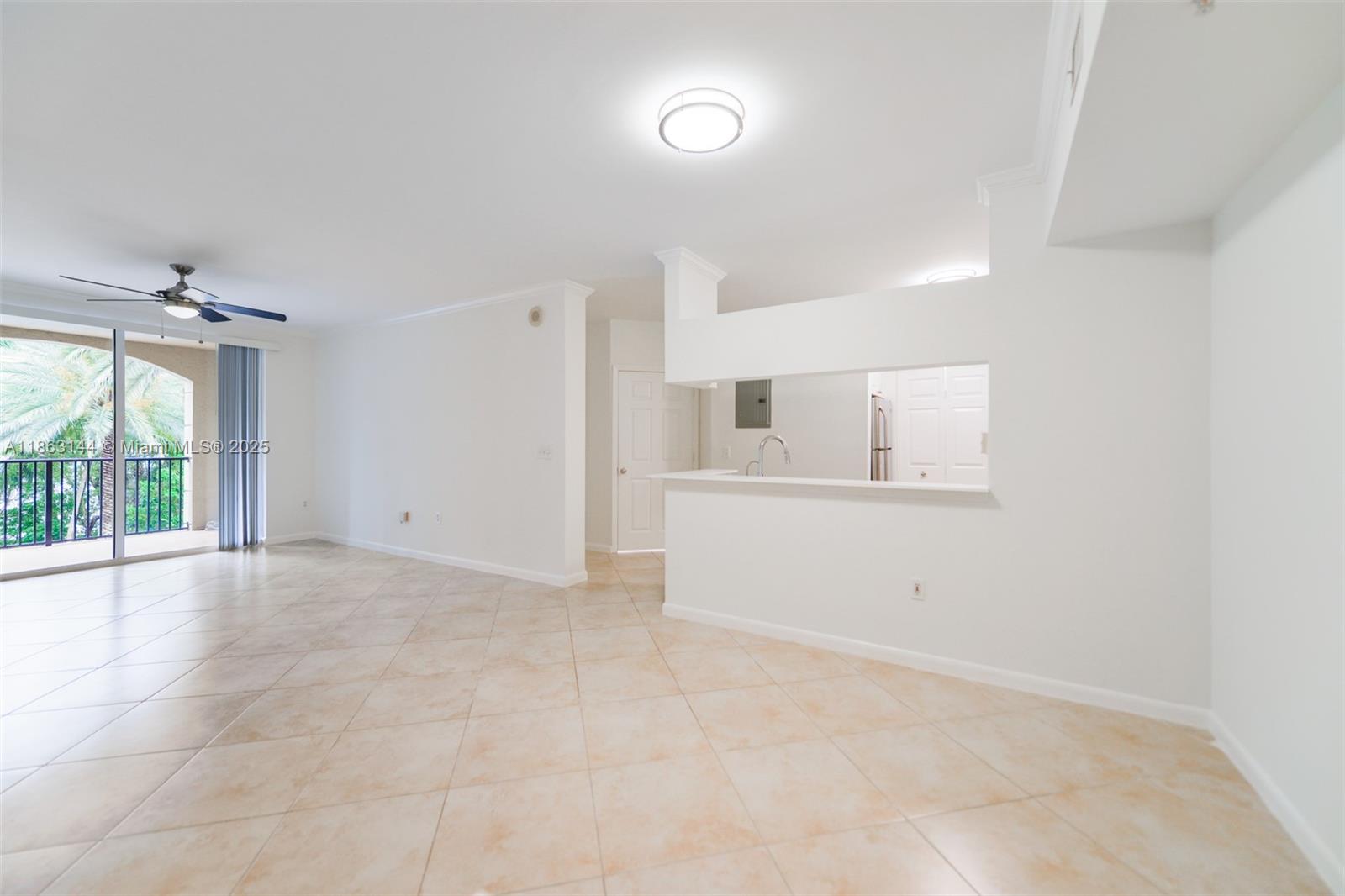 17100 North Bay Road, Unit 1303 Sunny Isles Beach, FL 33160 - Photo 17 of 24 a view of a kitchen with wooden floor and electronic appliances