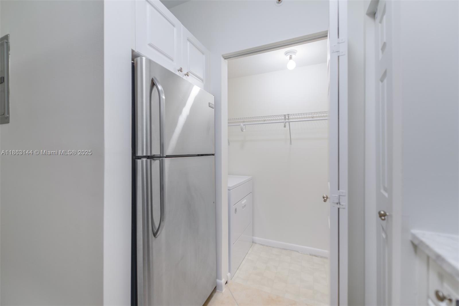 17100 North Bay Road, Unit 1303 Sunny Isles Beach, FL 33160 - Photo 6 of 24 a bathroom with a glass shower door