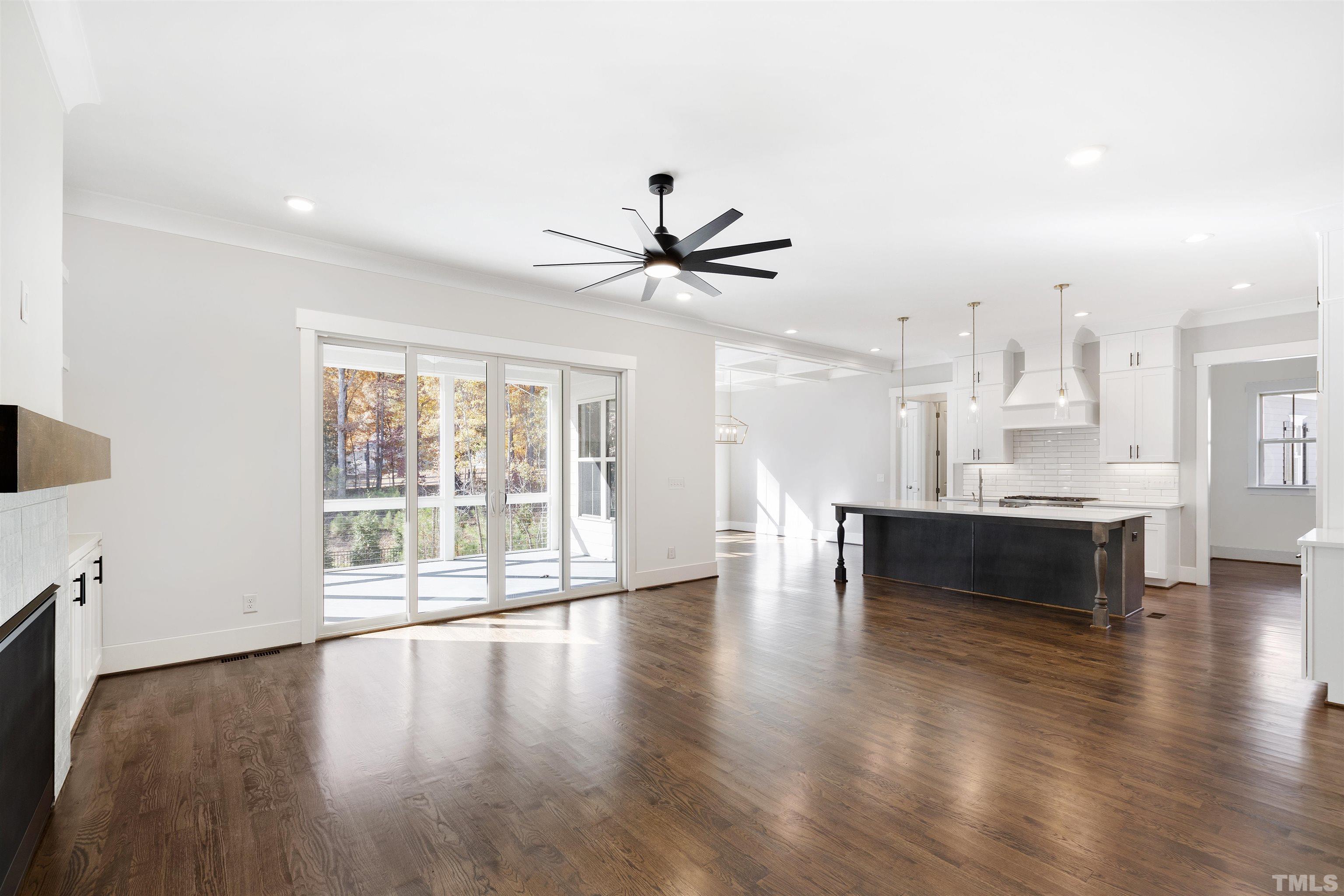 4013 Wilton Woods Place Cary, NC 27519 - Photo 11 of 30 a living room with furniture and a large window