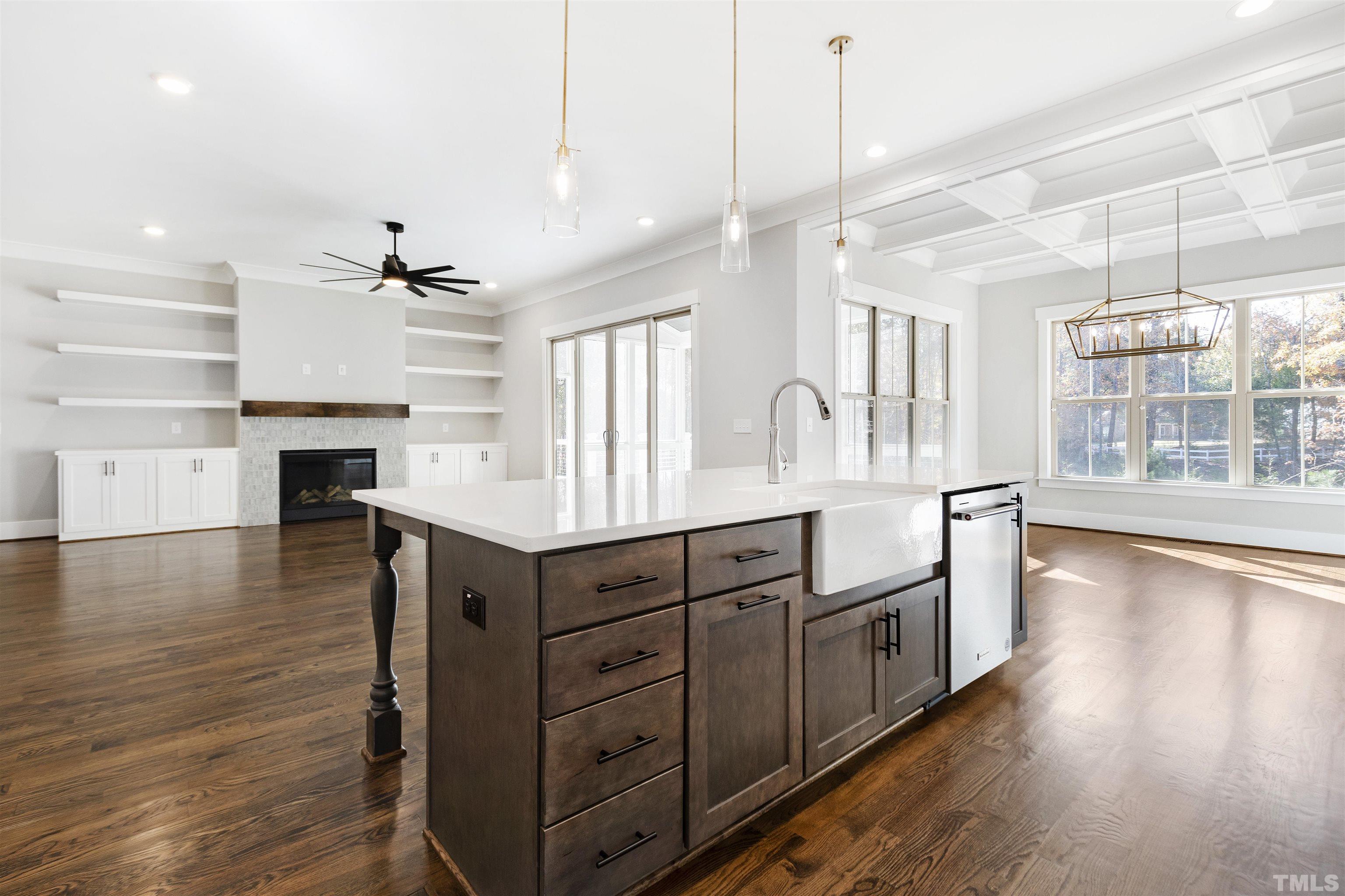 4013 Wilton Woods Place Cary, NC 27519 - Photo 17 of 30 a kitchen with stainless steel appliances granite countertop a stove oven and a wooden floors