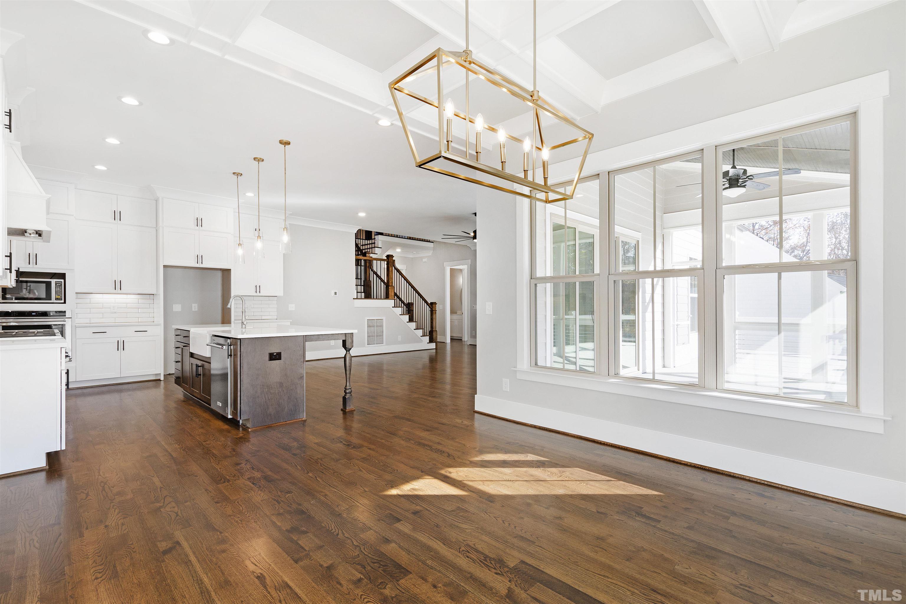 4013 Wilton Woods Place Cary, NC 27519 - Photo 18 of 30 a view of kitchen with furniture and wooden floor