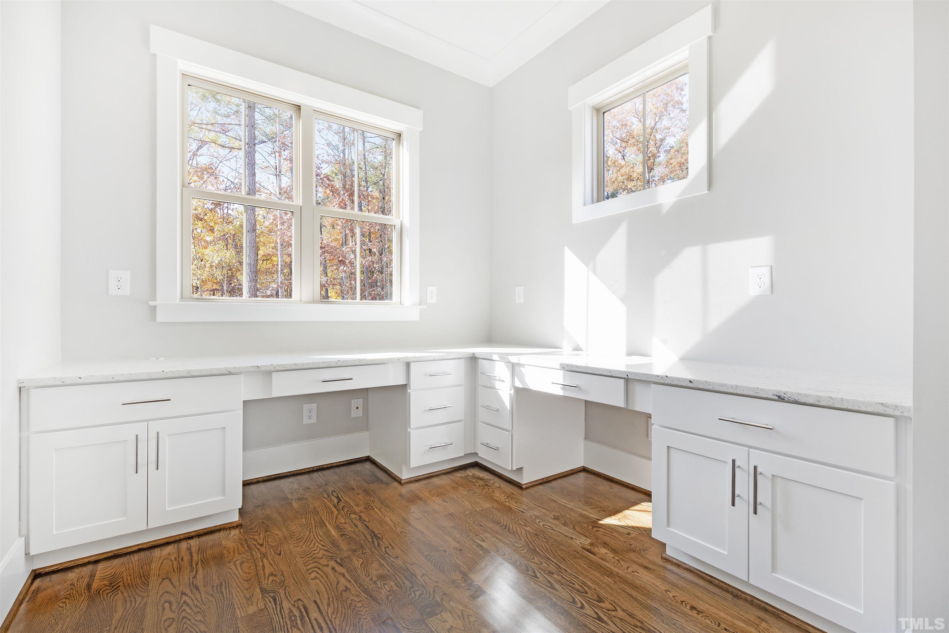 4013 Wilton Woods Place Cary, NC 27519 - Photo 20 of 30 a room with wooden floors and white walls