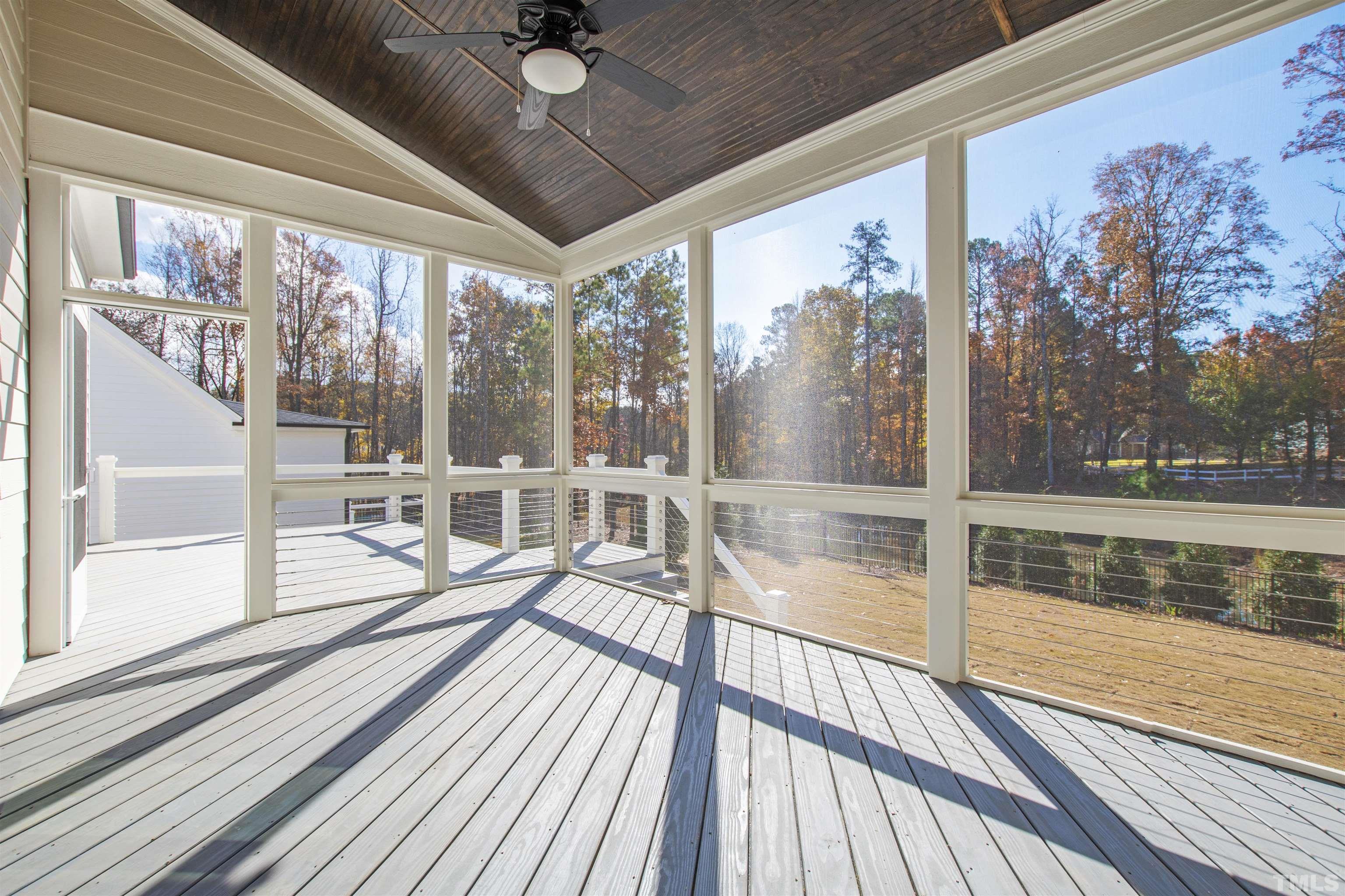 4013 Wilton Woods Place Cary, NC 27519 - Photo 27 of 30 a view of a balcony with wooden floor