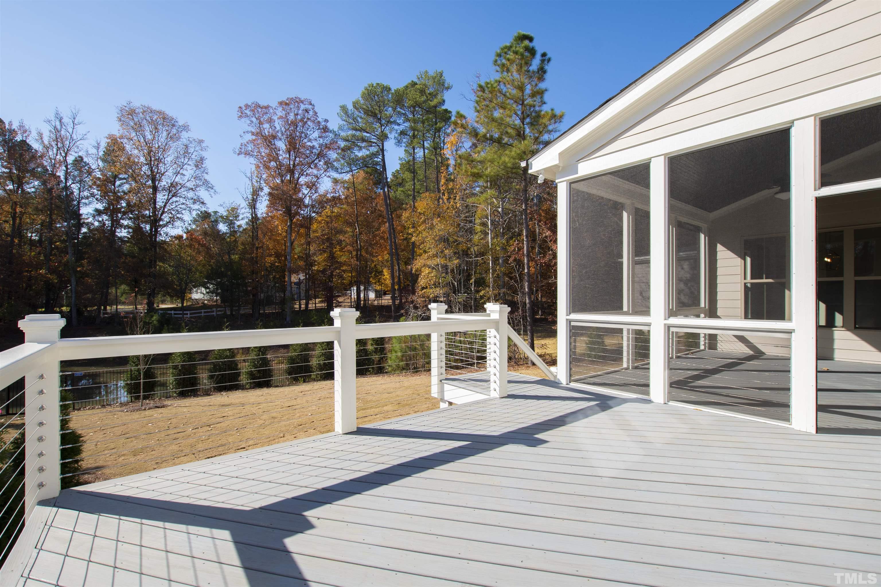 4013 Wilton Woods Place Cary, NC 27519 - Photo 28 of 30 a view of a house with wooden deck