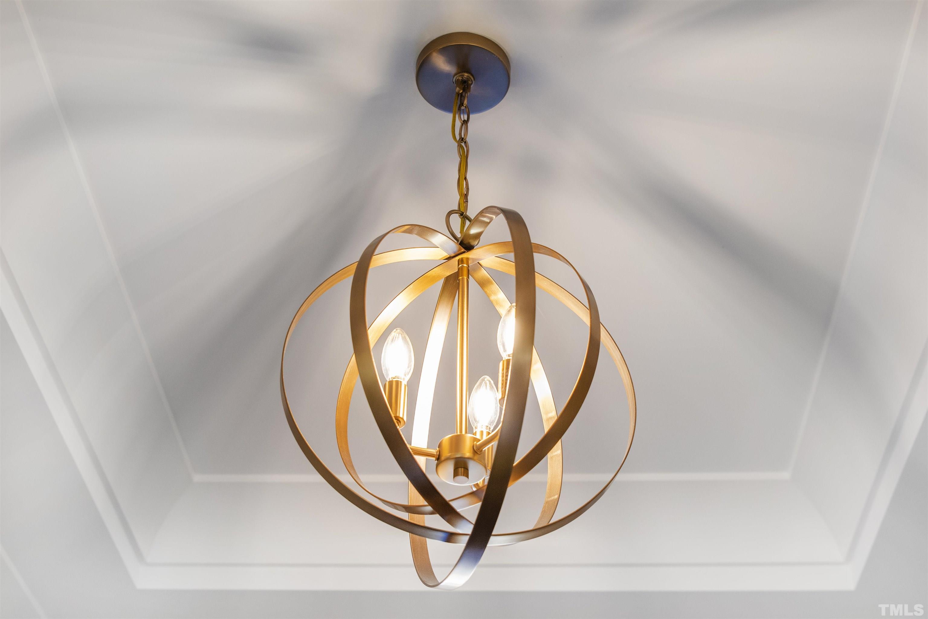 4013 Wilton Woods Place Cary, NC 27519 - Photo 7 of 30 a view of staircase with a potted plant and a chandelier