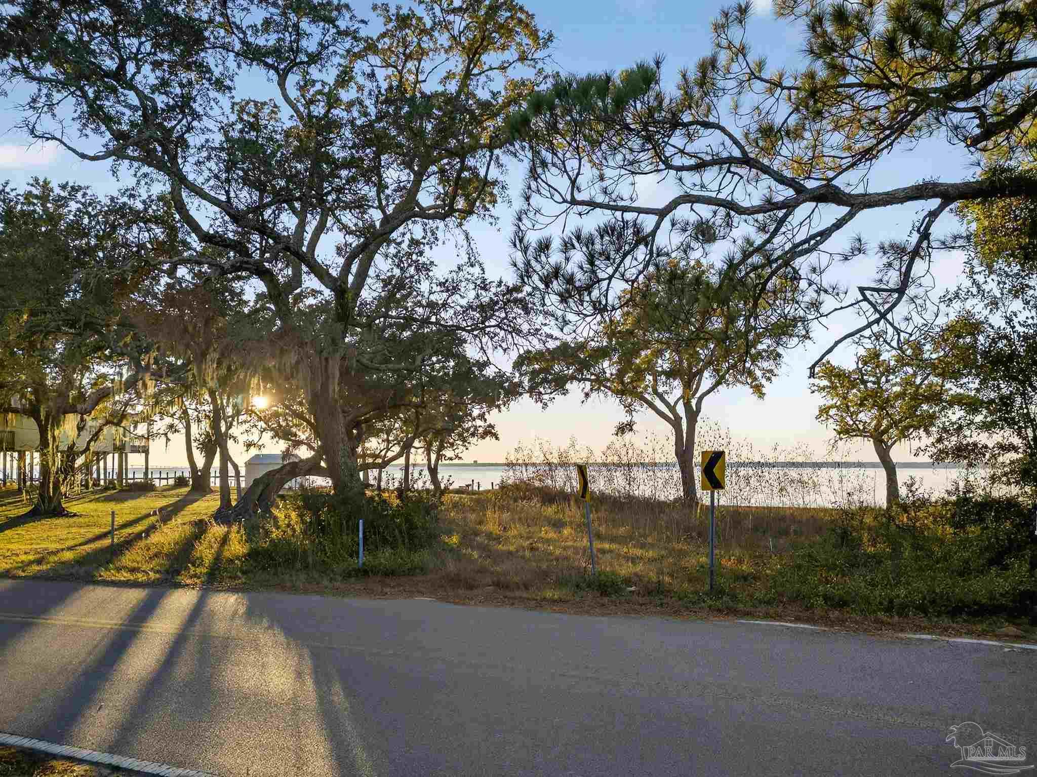 293 Garcon Point Road Milton, FL 32583 - Photo 7 of 12 a view of outdoor space and yard