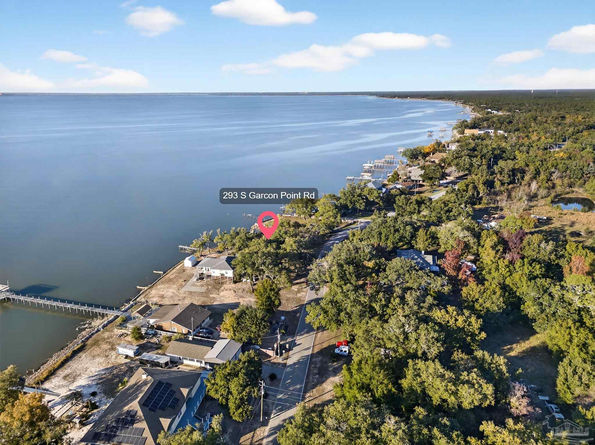 293 Garcon Point Road Milton, FL 32583 - Photo 9 of 12 a view of a garden