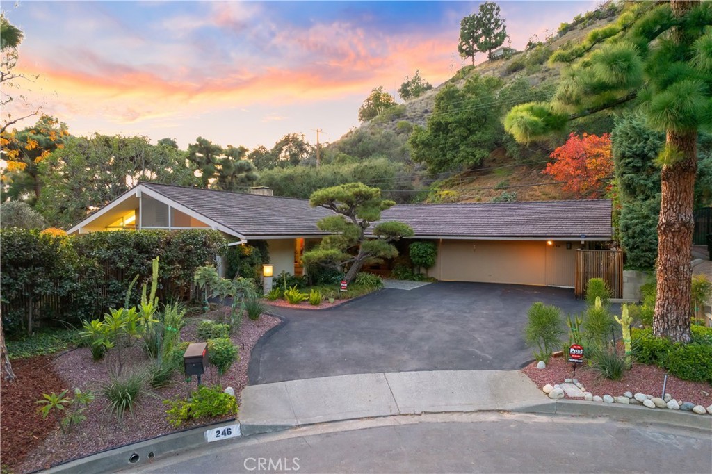 front view of a house with a street