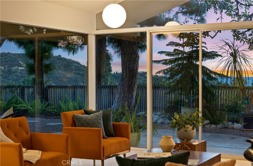 246 Angelo Place Arcadia, CA 91006 - Photo 15 of 72 a view of a patio with couches chairs and a potted plants