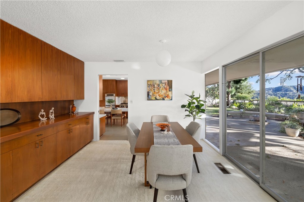 246 Angelo Place Arcadia, CA 91006 - Photo 25 of 72 a living room with furniture and a large window