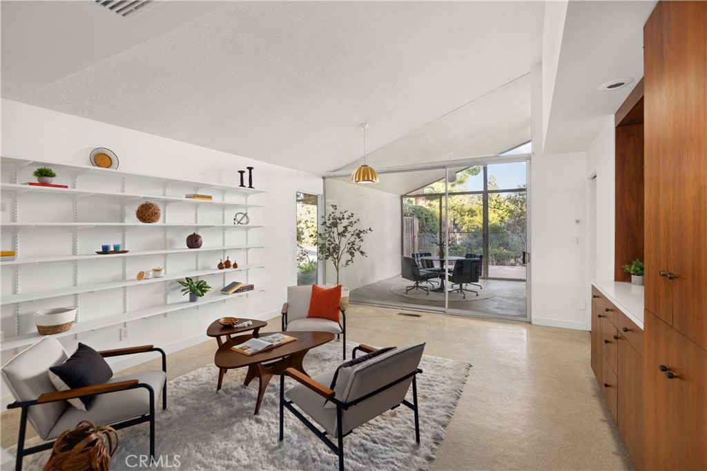 246 Angelo Place Arcadia, CA 91006 - Photo 32 of 72 a living room with furniture and a flat screen tv