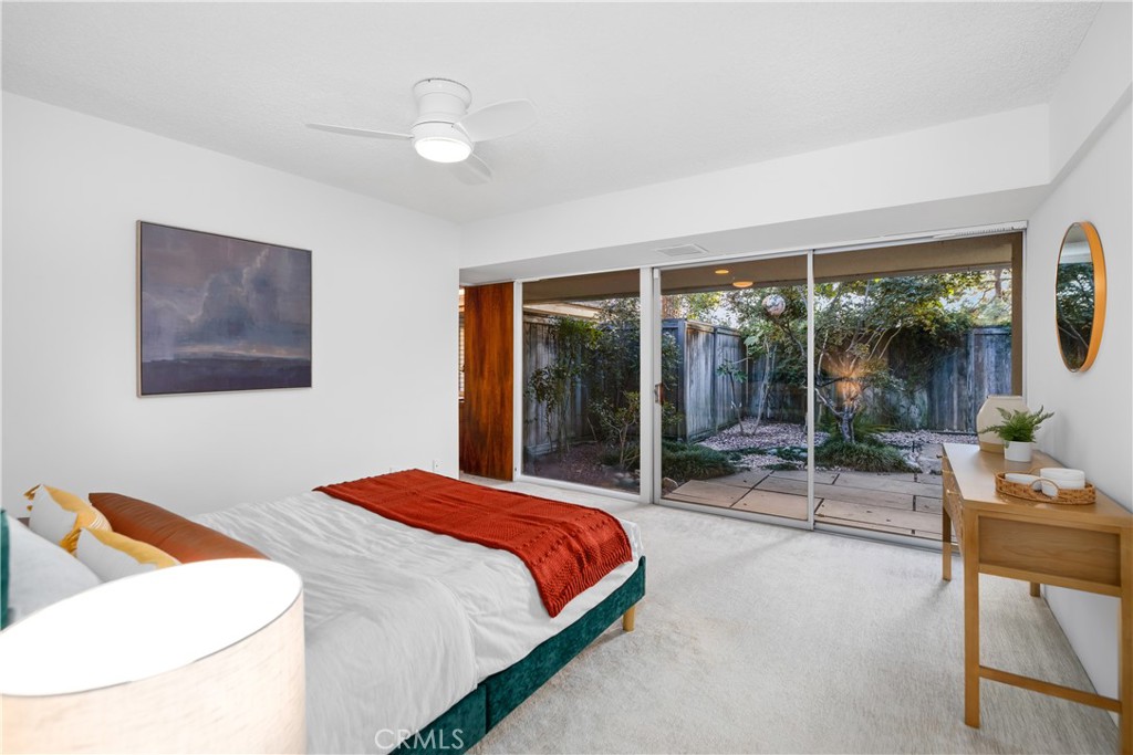 246 Angelo Place Arcadia, CA 91006 - Photo 38 of 72 a bedroom with a bed and glass window