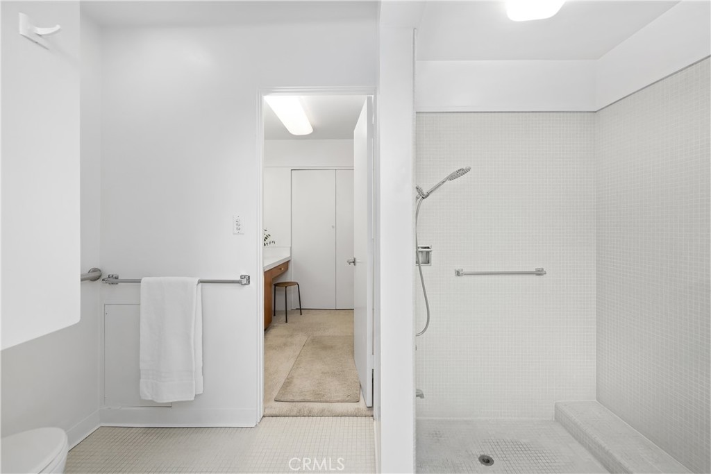 246 Angelo Place Arcadia, CA 91006 - Photo 41 of 72 a bathroom with a shower and a glass door