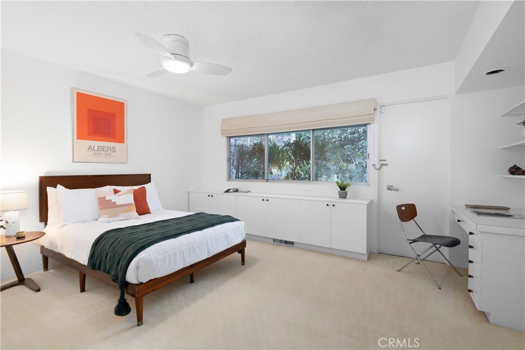 246 Angelo Place Arcadia, CA 91006 - Photo 44 of 72 a bedroom with a bed and a large window