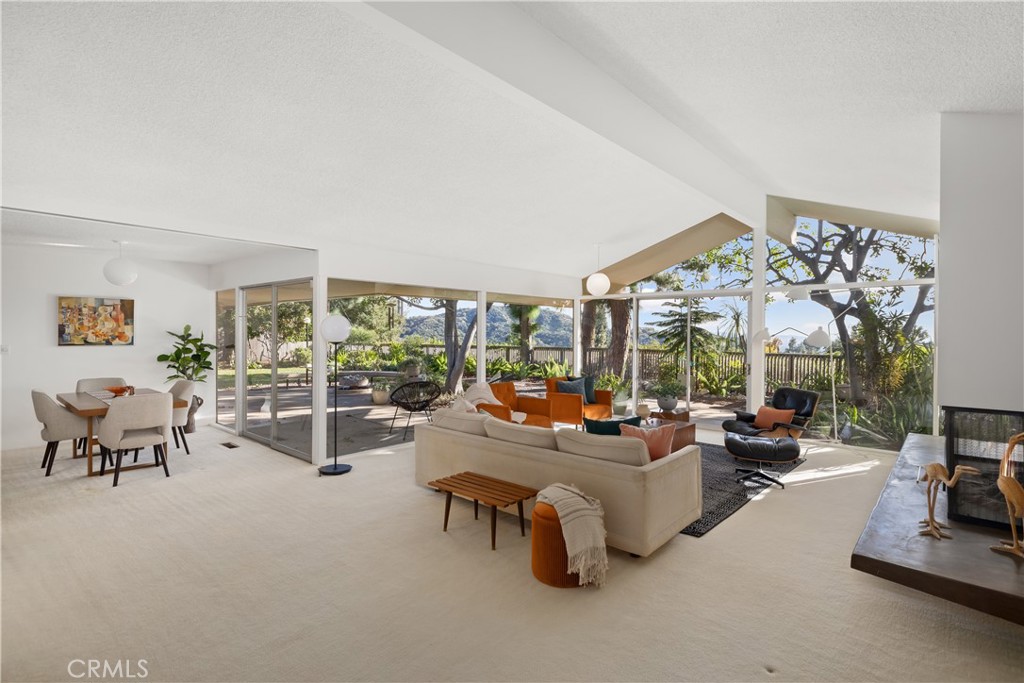 246 Angelo Place Arcadia, CA 91006 - Photo 6 of 72 a living room with furniture and a large window