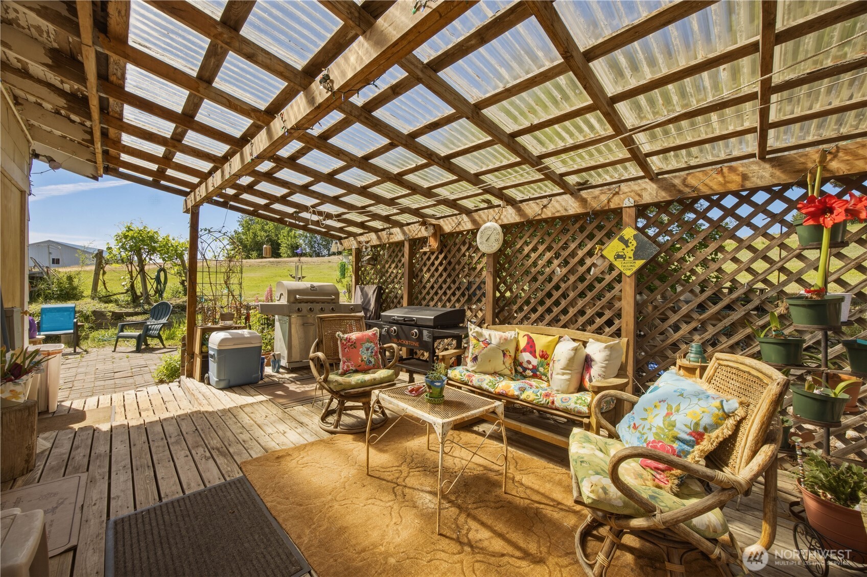 1281 Totem Pole Road Manson, WA 98831 - Photo 22 of 39 a view of a chairs and table in a patio