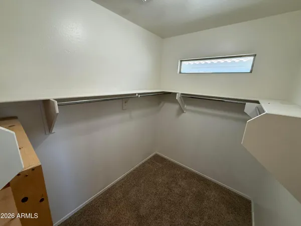 a view of a room with racks on the wall