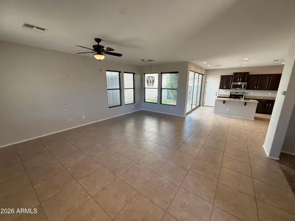 a view of livingroom with hardwood floor and a ceiling fan