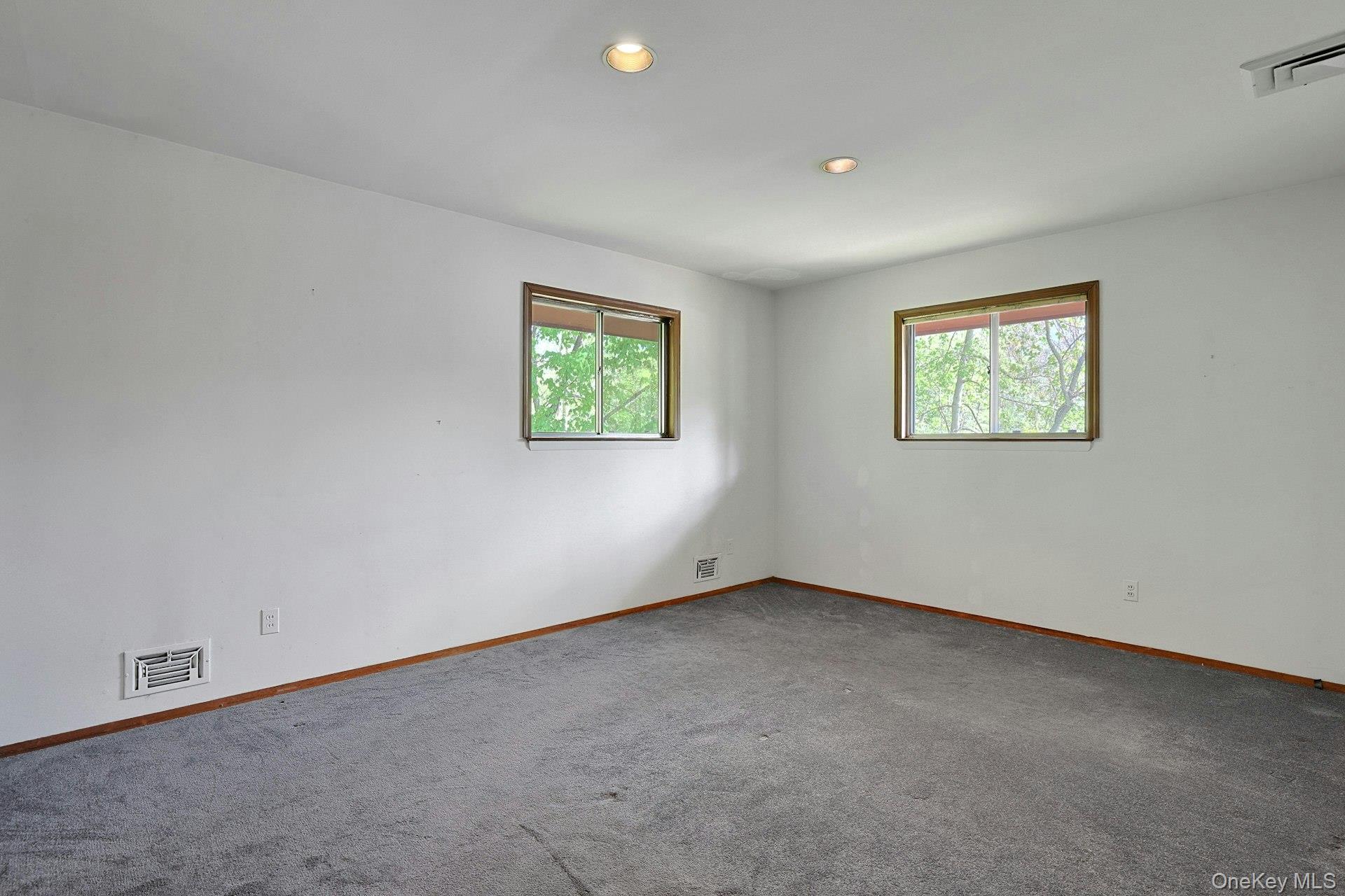 44 Southgate Drive Spring Valley, NY 10977 - Photo 16 of 24 an empty room with windows