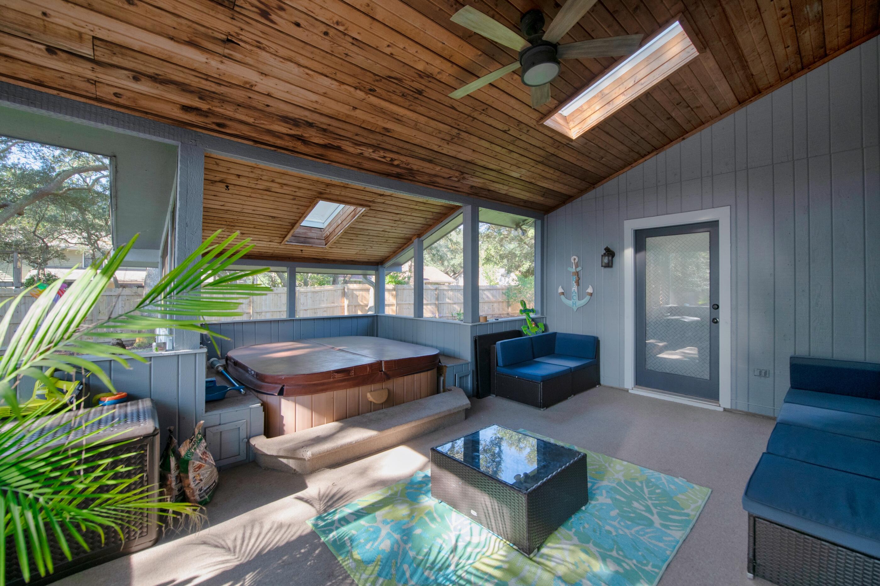 708 Caribbean Way Niceville, FL 32578 - Photo 36 of 42 a living room with furniture and a wooden floor