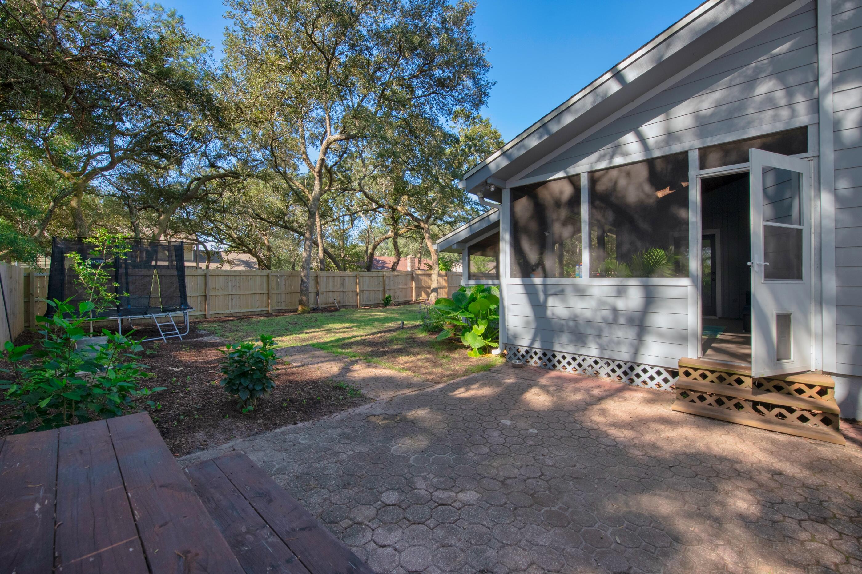 708 Caribbean Way Niceville, FL 32578 - Photo 38 of 42 a view of a house with a yard