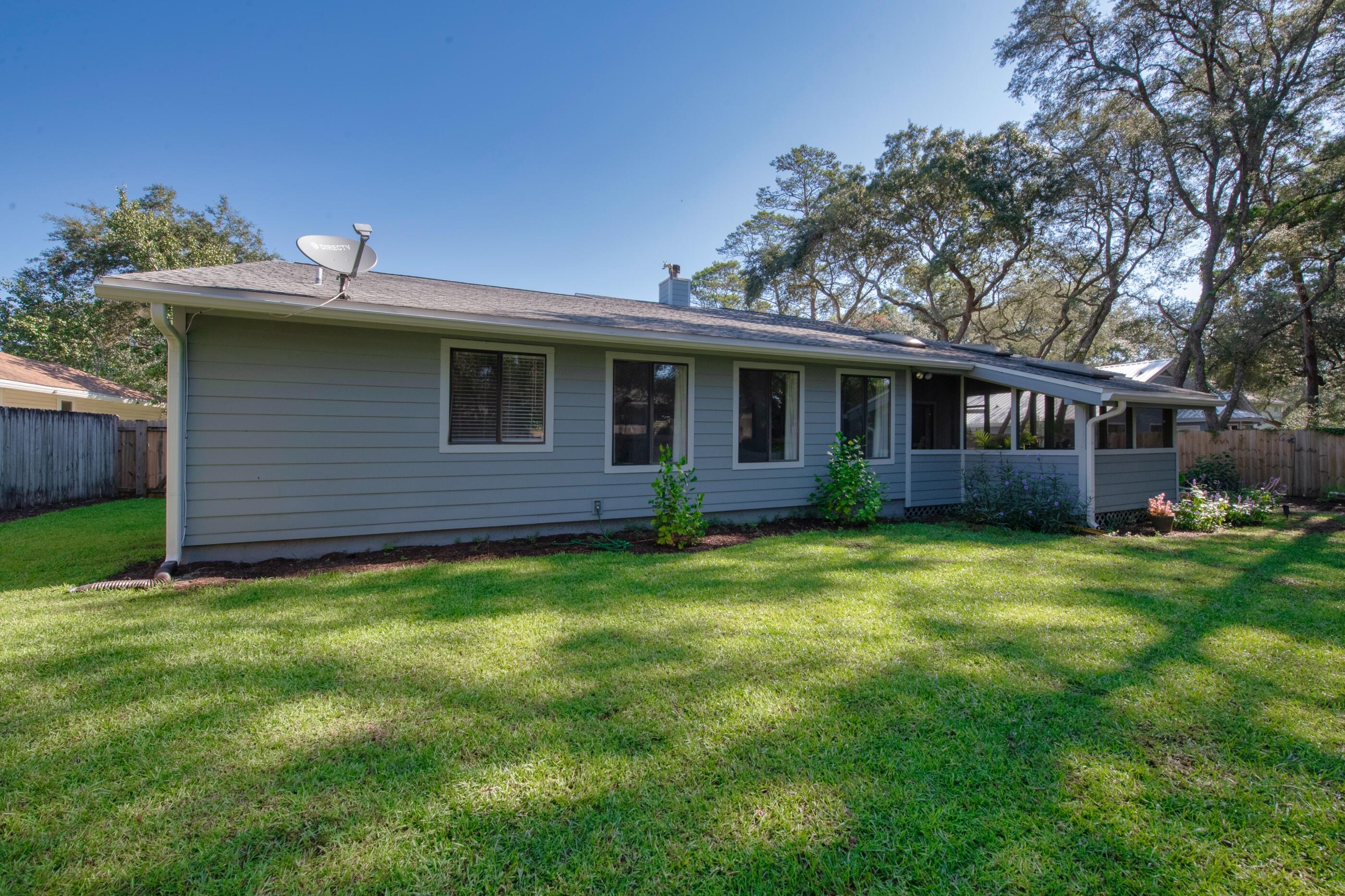708 Caribbean Way Niceville, FL 32578 - Photo 41 of 42 a view of a house with a backyard