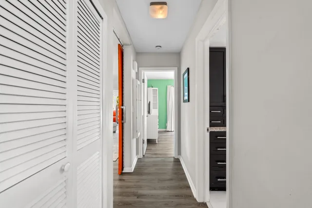 a view of a swimming pool with a potted plants