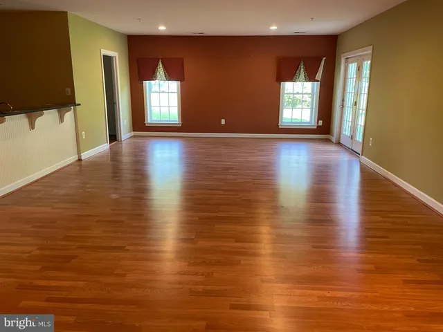 a bathroom with a sink a vanity and a mirror