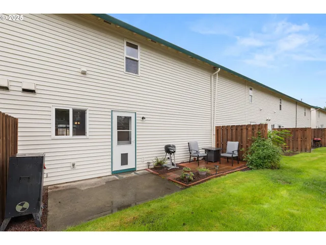 a garage with furniture and a chandelier