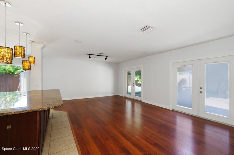 964 Samar Road Cocoa Beach, FL 32931 - Photo 4 of 10 04_964SamarRd_3_FamilyRoom_FlexMLS800x60