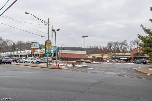 a view of a street with cars