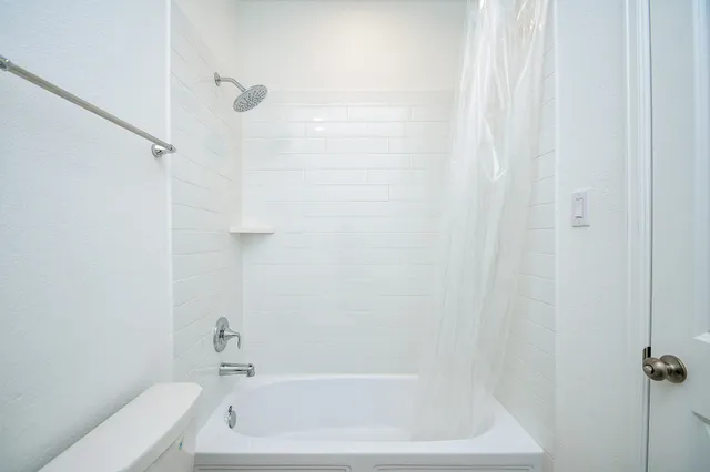 a bathroom with a bathtub