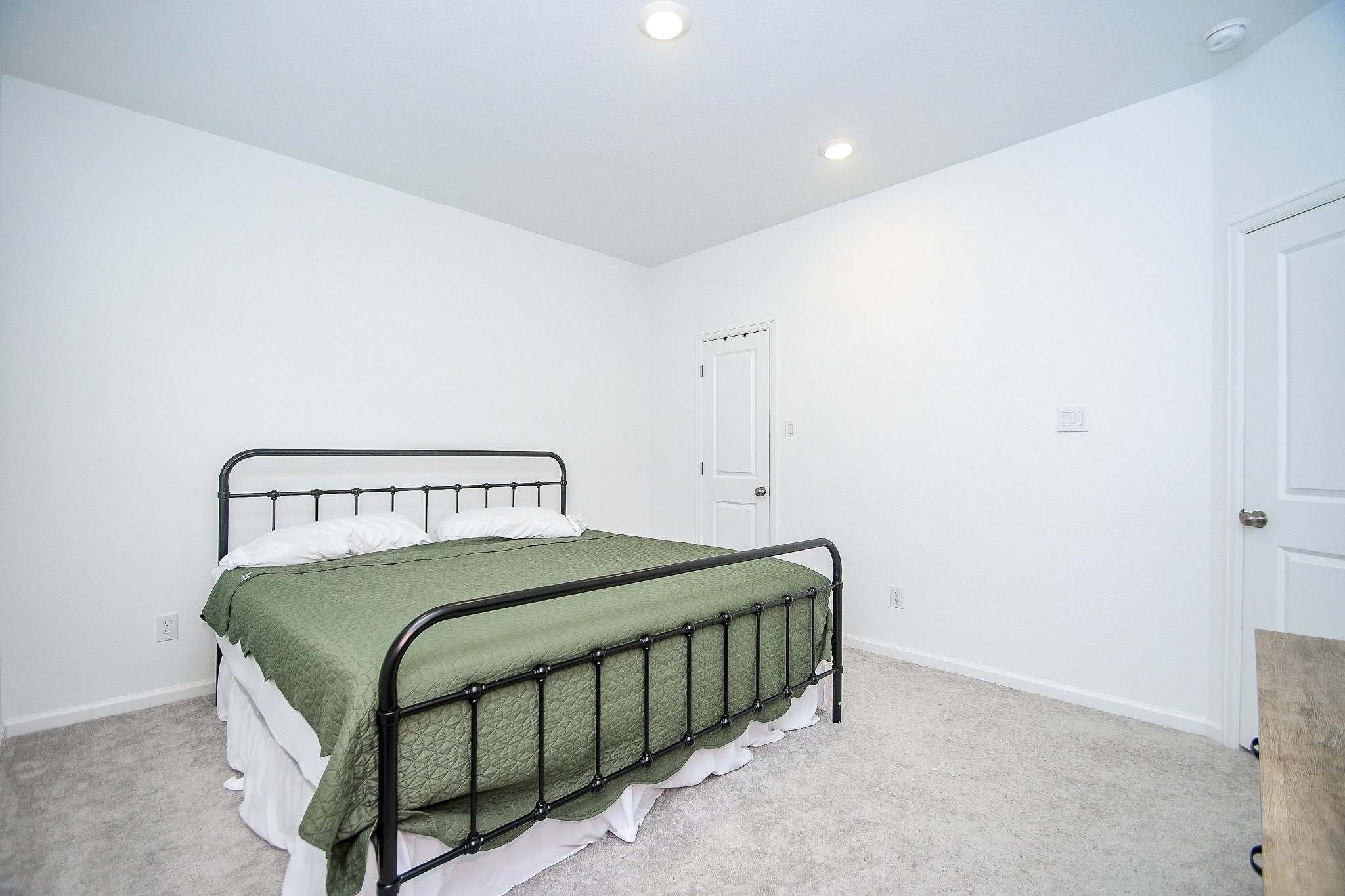 28722 Mount Bonnell Drive New Caney, TX 77357 - Photo 21 of 32 a bedroom with a bed and a dresser