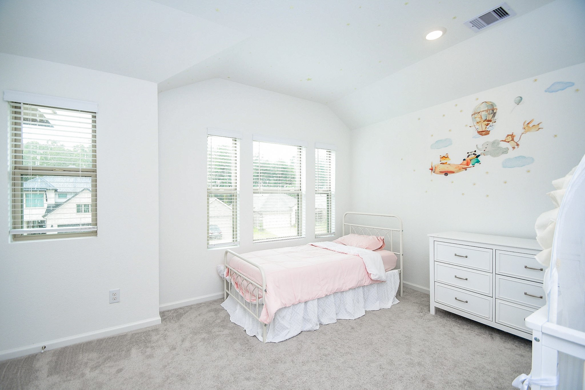 28722 Mount Bonnell Drive New Caney, TX 77357 - Photo 22 of 32 a bedroom with a bed and a window