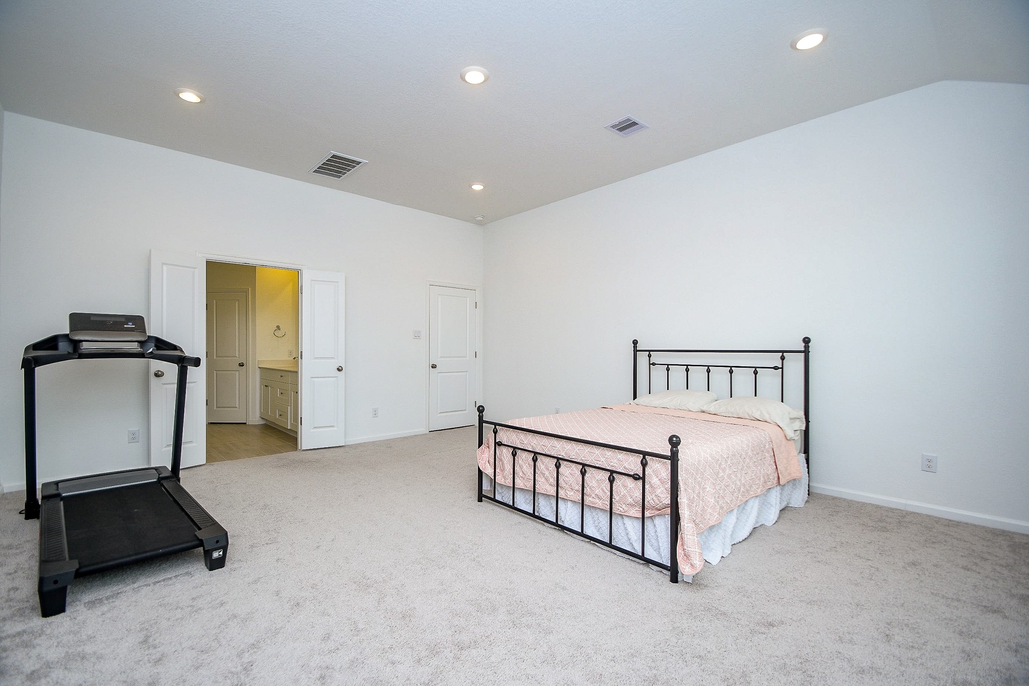 28722 Mount Bonnell Drive New Caney, TX 77357 - Photo 27 of 32 a bed room with a bed and a night stand