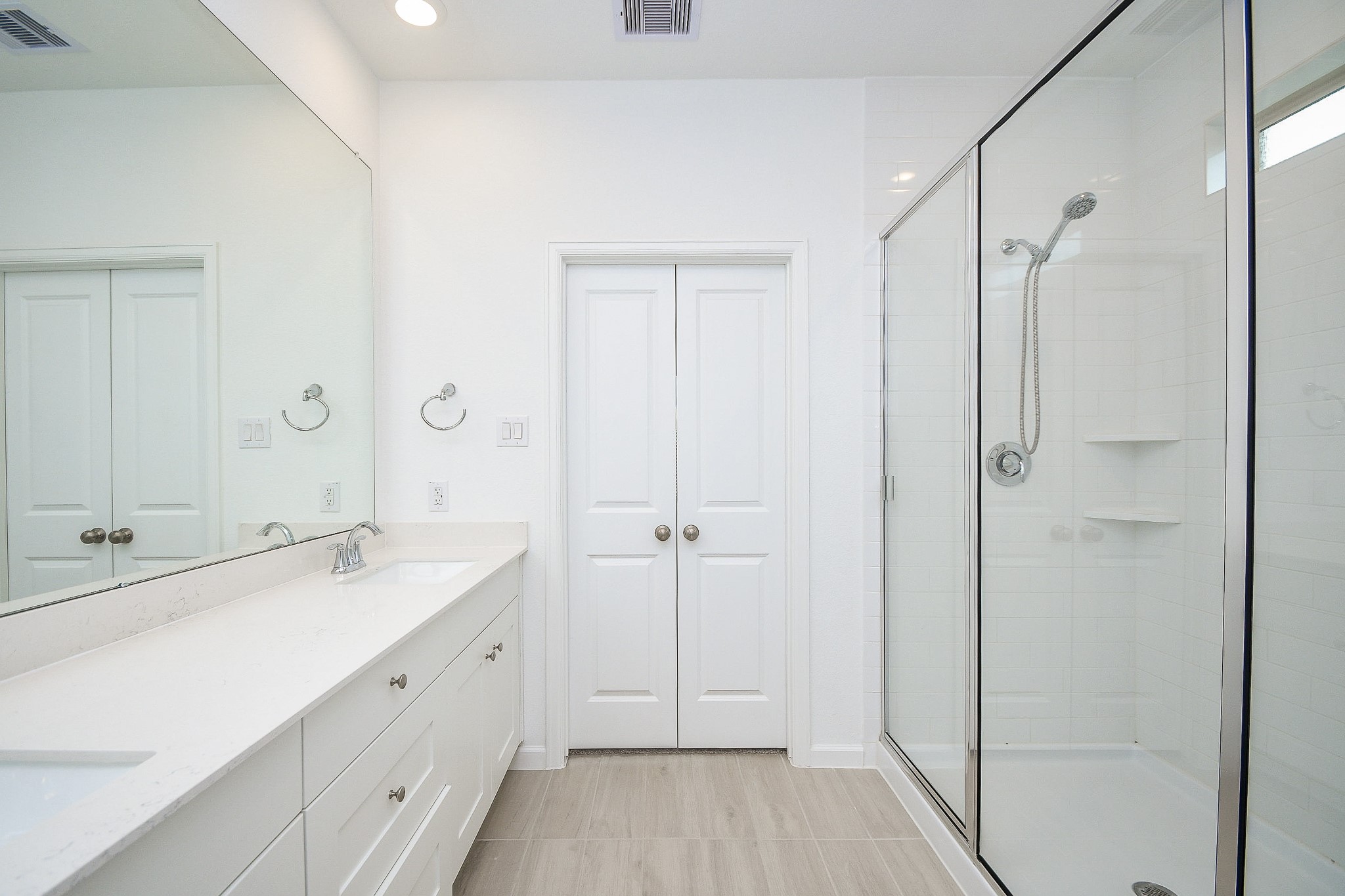 28722 Mount Bonnell Drive New Caney, TX 77357 - Photo 29 of 32 a spacious bathroom with a shower and a sink