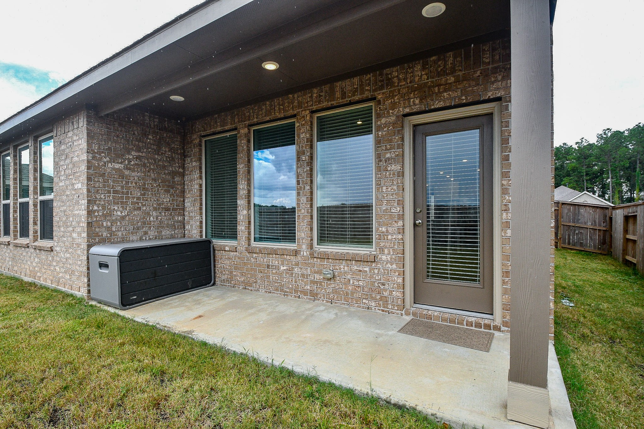 28722 Mount Bonnell Drive New Caney, TX 77357 - Photo 31 of 32 a view of house with backyard