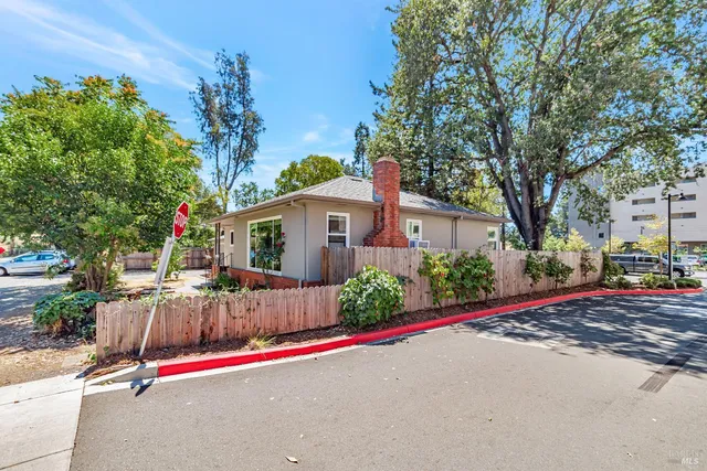 a view of street next to a yard