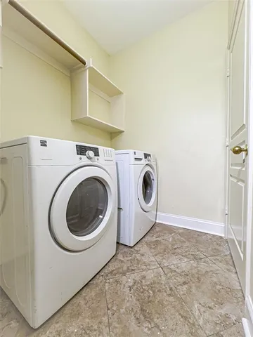 a view of an entryway with wooden floor and stairs