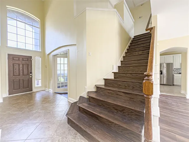 a view of a hallway with a small entryway