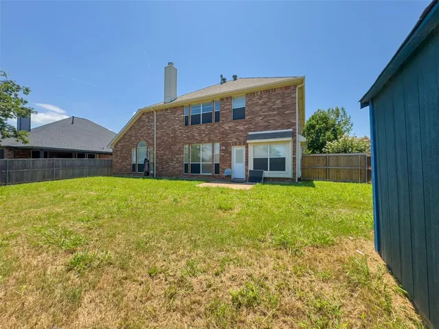a front view of house with yard
