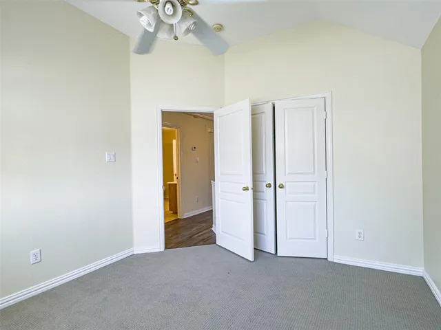 an empty room with a bathroom