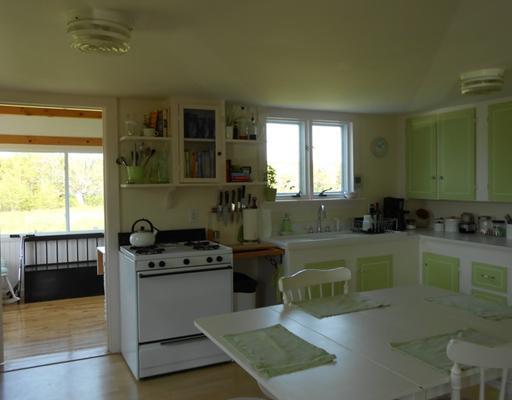 110 Wardwell Point Road Penobscot, ME 04476 - Photo 11 of 22 Kitchen. Looking into sunroom