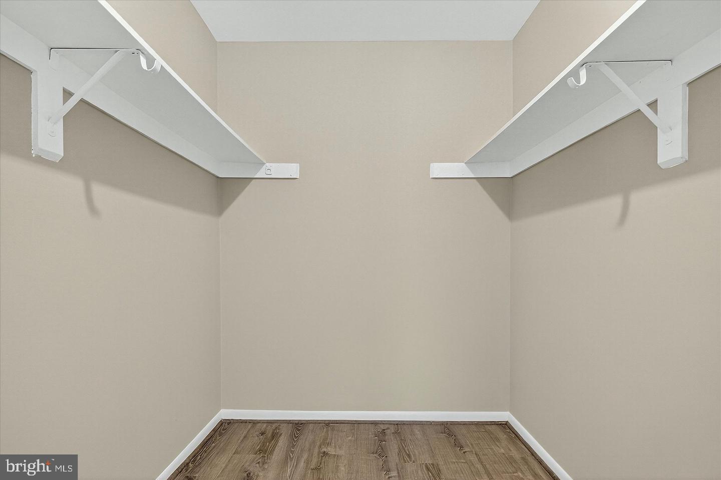 402 Reneau Way Herndon, VA 20170 - Photo 13 of 23 a view of an empty walk in closet