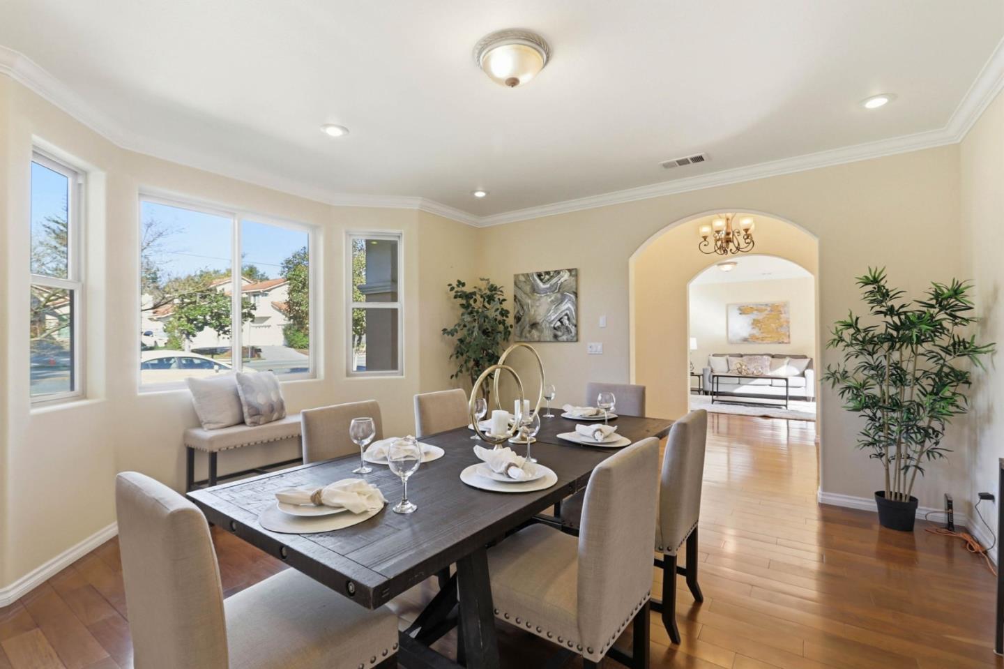 1352 South Stelling Road Cupertino, CA 95014 - Photo 12 of 49 a view of a dining room with furniture window and wooden floor