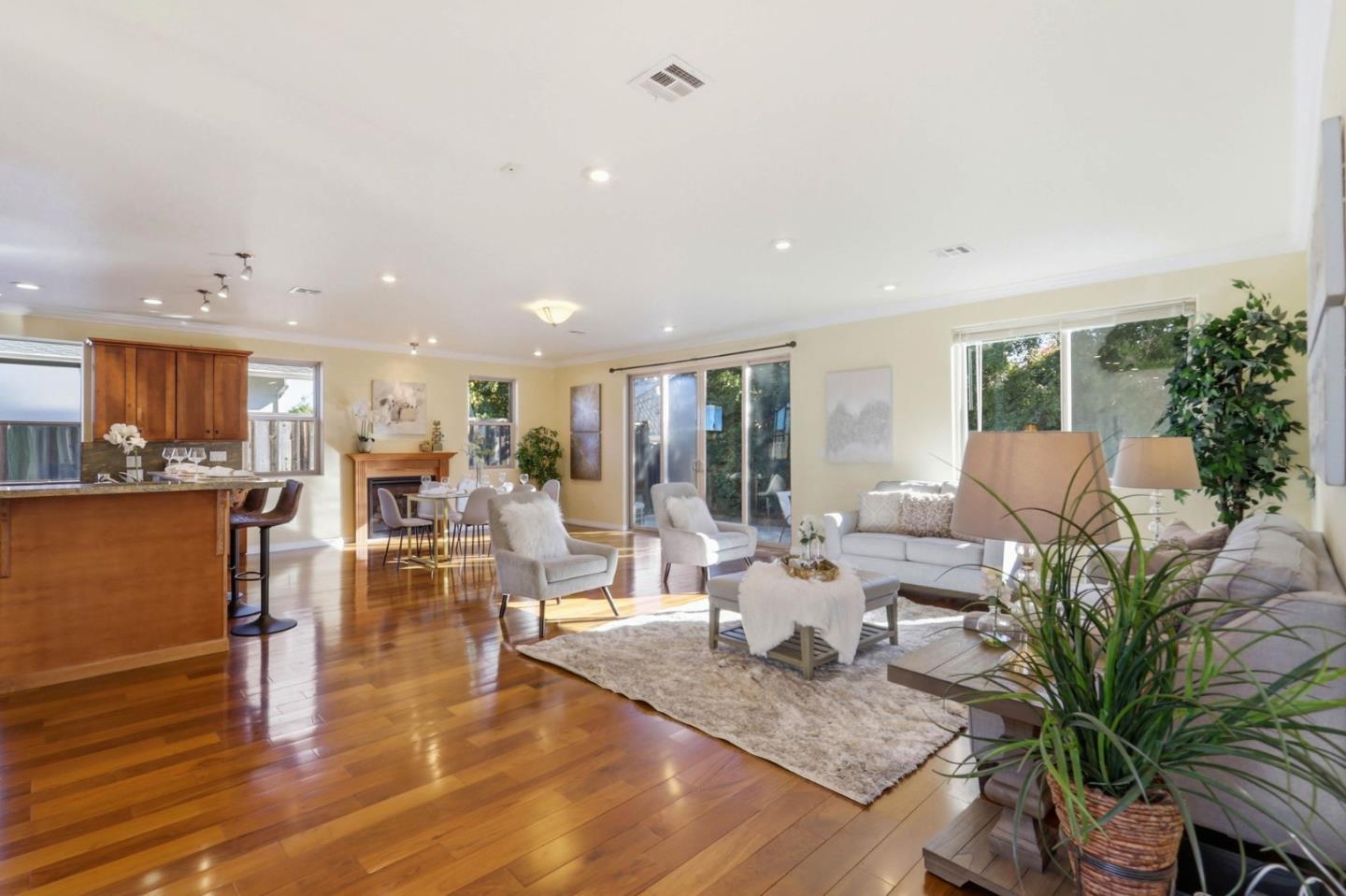 1352 South Stelling Road Cupertino, CA 95014 - Photo 13 of 49 a living room with furniture kitchen view and a potted plant