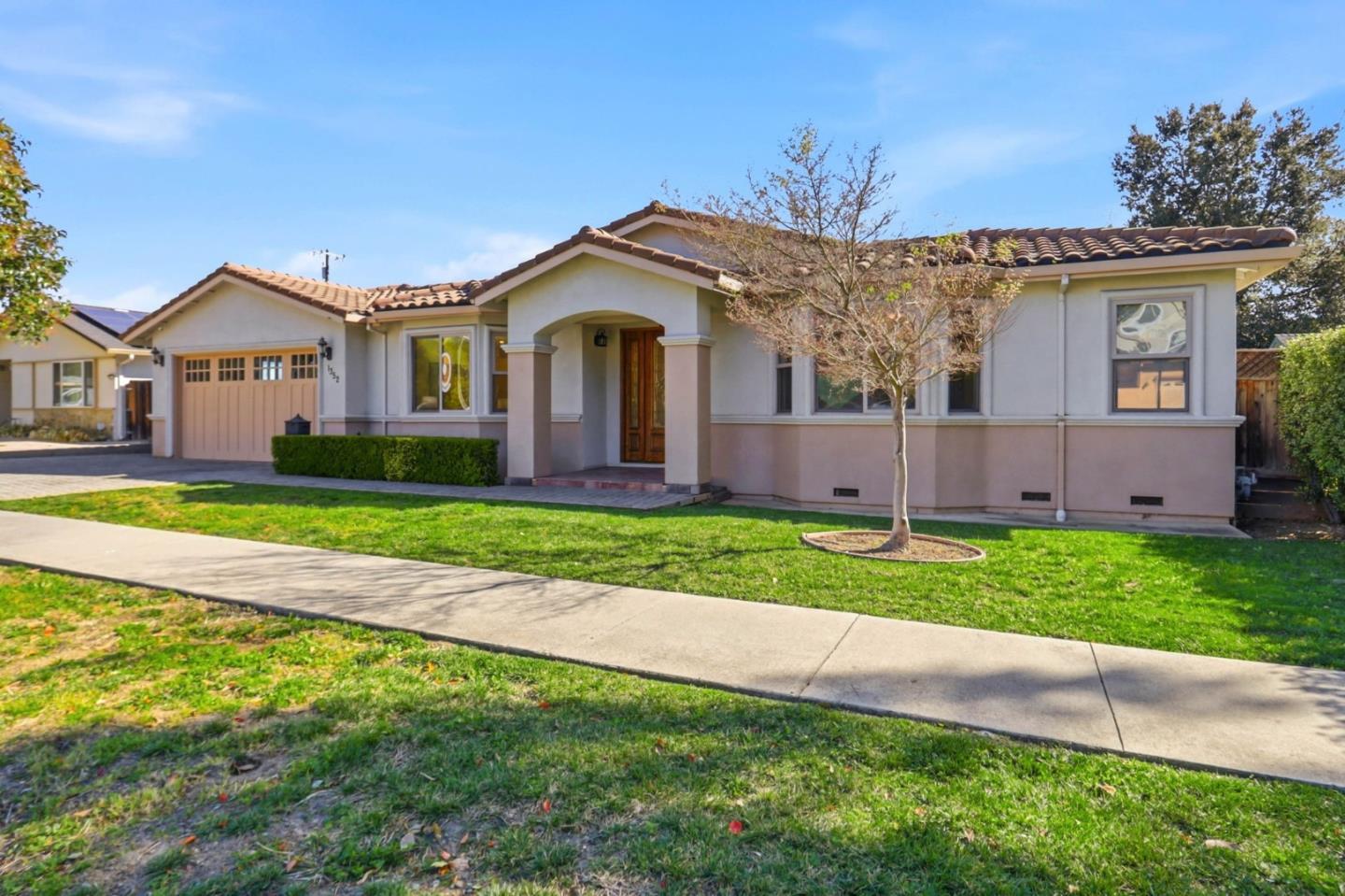 1352 South Stelling Road Cupertino, CA 95014 - Photo 3 of 49 a view of house with a garden