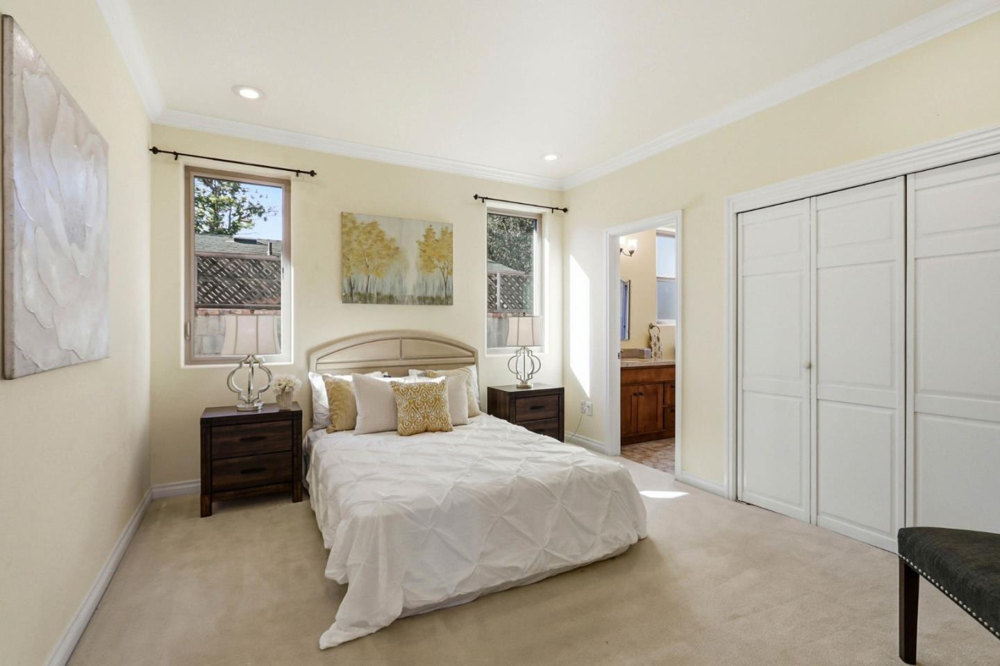 1352 South Stelling Road Cupertino, CA 95014 - Photo 36 of 49 a bedroom with a bed and a couch