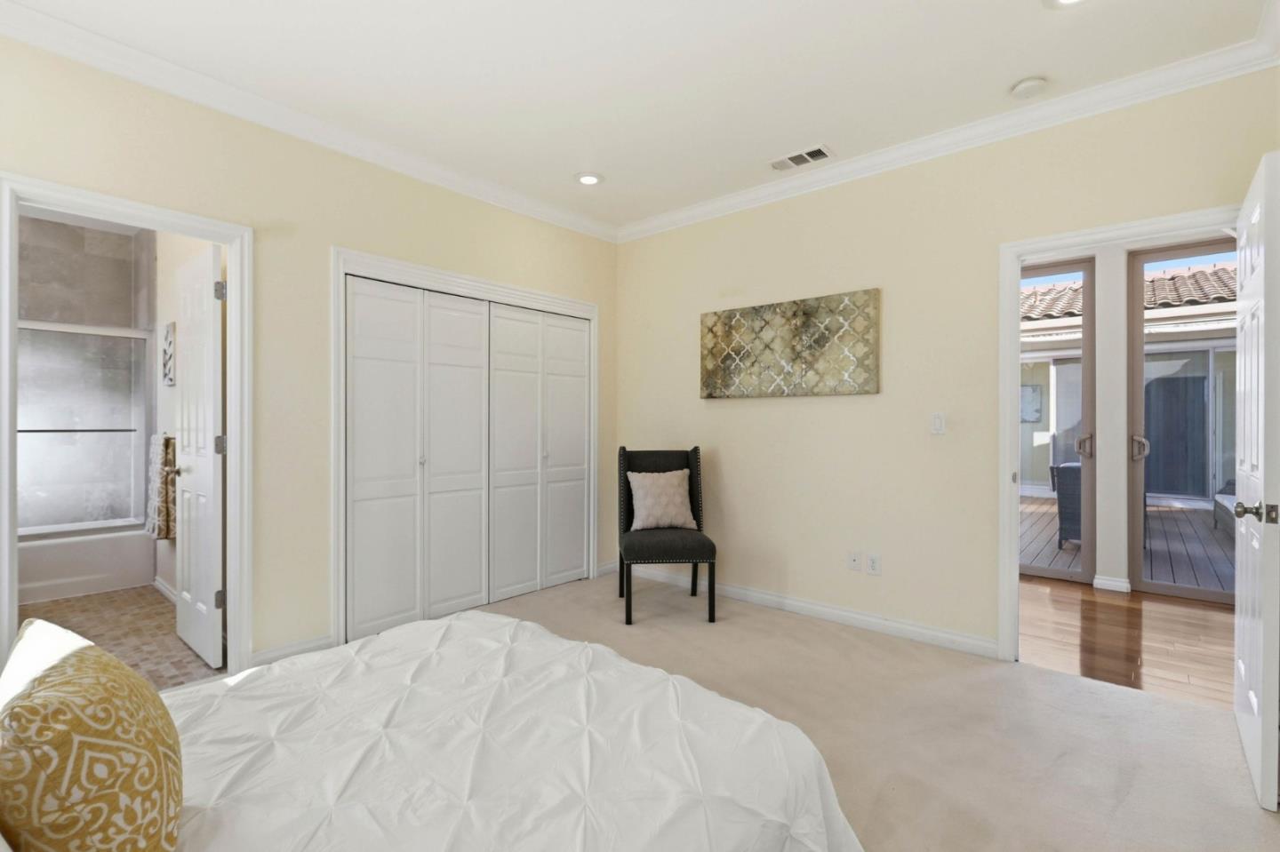 1352 South Stelling Road Cupertino, CA 95014 - Photo 37 of 49 a bedroom with a bed and a painting on the wall